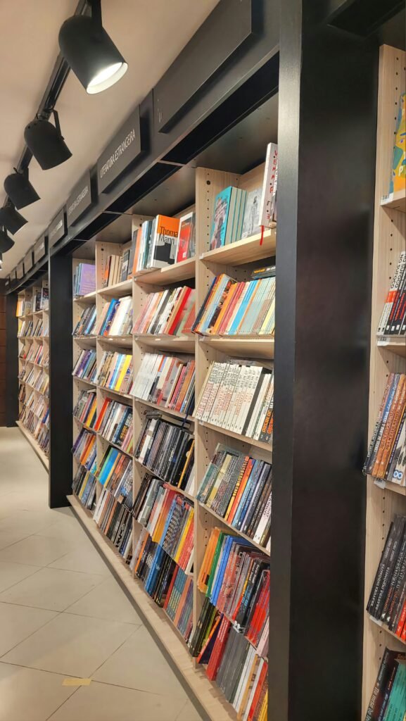 a row of bookshelves filled with lots of books